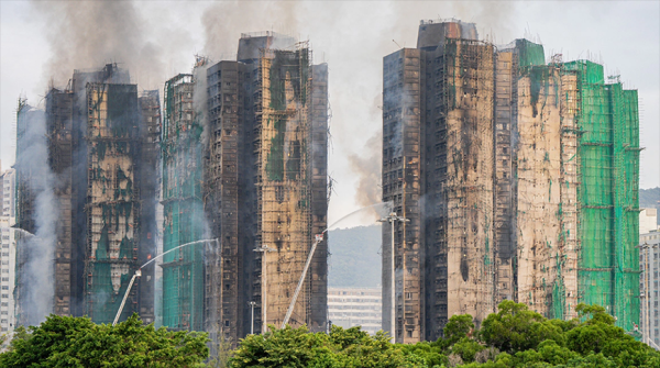 Число погибших при пожаре в жилом комплексе в Гонконге достигло 156